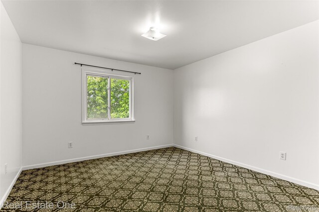 1625 Ferney St, Dearborn Heights, MI 48120 - unfurnished room featuring baseboards