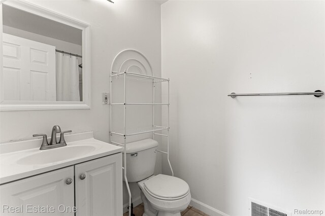 1625 Ferney St, Dearborn Heights, MI 48120 - bathroom featuring vanity and toilet