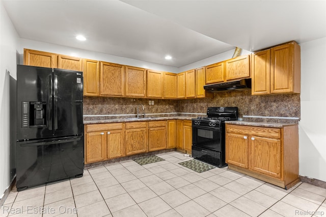 1625 Ferney St, Dearborn Heights, MI 48120 - kitchen with black appliances, under cabinet range hood, backsplash, dark countertops, and recessed lighting