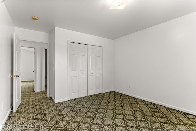 1625 Ferney St, Dearborn Heights, MI 48120 - unfurnished bedroom featuring baseboards and a closet