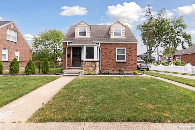 15404 Belmont Ave, Allen Park, MI 48101 - new england style home with a shingled roof and brick siding