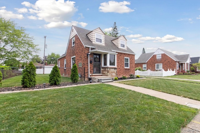 15404 Belmont Ave, Allen Park, MI 48101 - new england style home with brick siding and roof with shingles