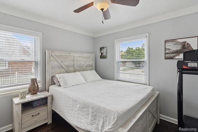 15404 Belmont Ave, Allen Park, MI 48101 - bedroom featuring multiple windows, dark wood-type flooring, and ceiling fan