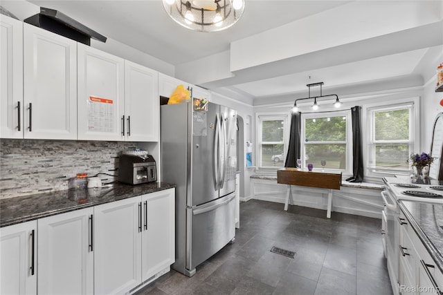 15433 Kinloch, Redford, MI 48239 - kitchen with freestanding refrigerator, a raised ceiling, white range with electric cooktop, and white cabinetry