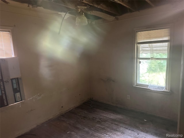 15921 Bramell St, Detroit, MI 48223 - spare room with dark wood-type flooring and ceiling fan