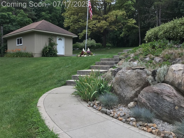 5074 Perryville Rd, Holly, MI 48442 - view of green lawn featuring an outdoor structure
