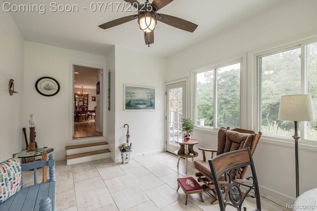 5074 Perryville Rd, Holly, MI 48442 - sitting room featuring baseboards and a ceiling fan