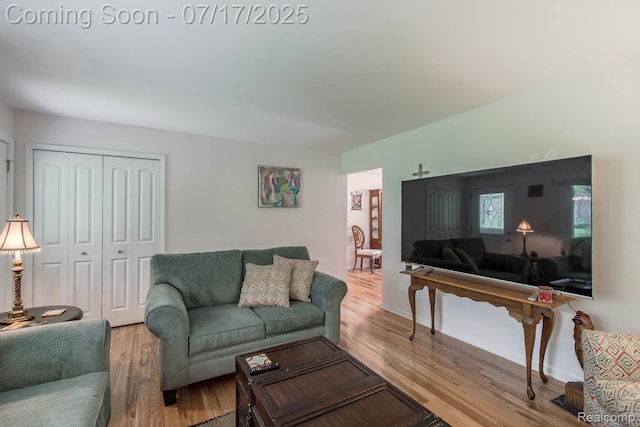 5074 Perryville Rd, Holly, MI 48442 - living area with light wood finished floors and baseboards