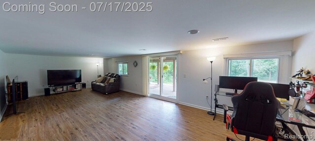5074 Perryville Rd, Holly, MI 48442 - home office featuring wood finished floors and baseboards