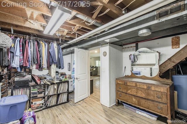 5074 Perryville Rd, Holly, MI 48442 - unfinished basement featuring wood finished floors
