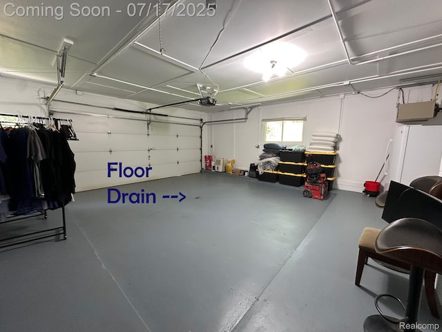 5074 Perryville Rd, Holly, MI 48442 - garage with freestanding refrigerator