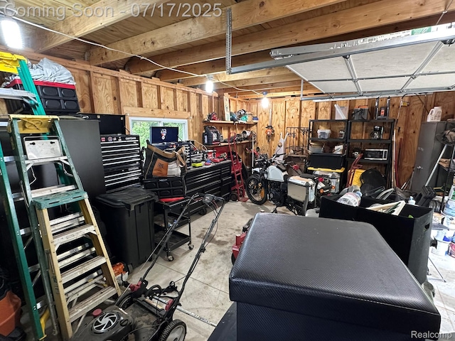 5074 Perryville Rd, Holly, MI 48442 - garage featuring a workshop area