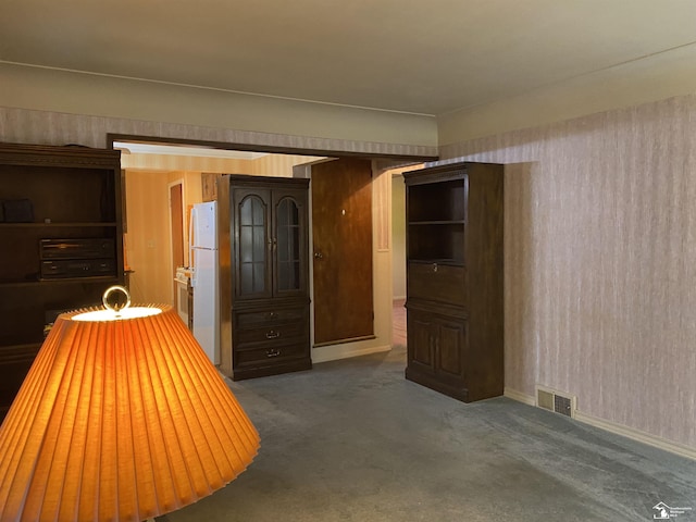 3897 15th St, Wyandotte, MI 48192 - dining room with carpet and baseboards