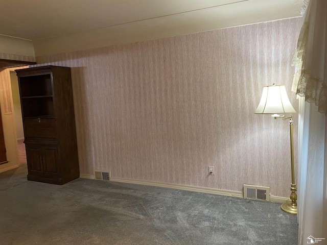 3897 15th St, Wyandotte, MI 48192 - spare room with carpet flooring and baseboards