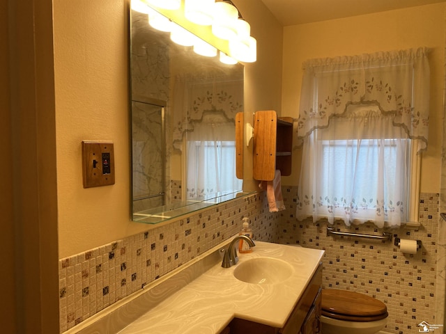 3897 15th St, Wyandotte, MI 48192 - bathroom with vanity and tasteful backsplash