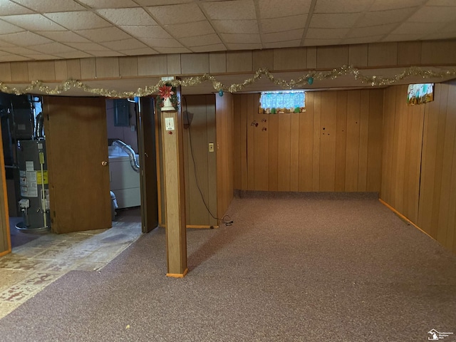 3897 15th St, Wyandotte, MI 48192 - finished basement featuring gas water heater, carpet floors, a paneled ceiling, and wood walls