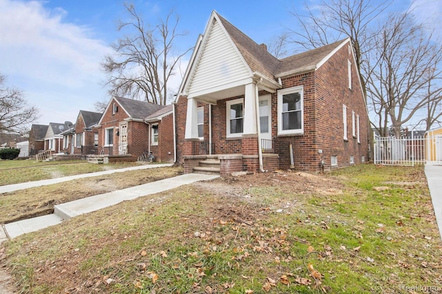 8131 Coyle St, Detroit, MI 48228 - view of front of house featuring brick siding, covered porch, and a residential view