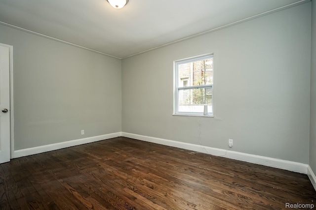 17344 Wisconsin St, Detroit, MI 48221 - empty room with dark wood finished floors and ornamental molding