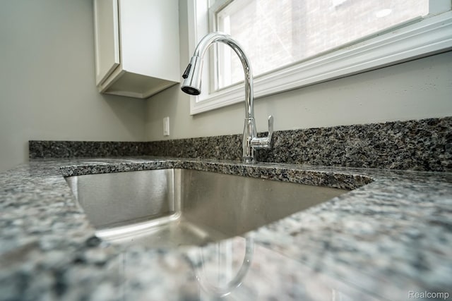 17344 Wisconsin St, Detroit, MI 48221 - kitchen view of white cabinetry and dark stone countertops