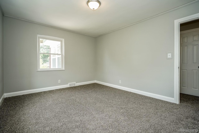 17344 Wisconsin St, Detroit, MI 48221 - empty room with dark colored carpet and ornamental molding
