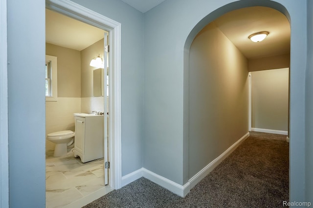 17344 Wisconsin St, Detroit, MI 48221 - hallway featuring arched walkways and carpet floors