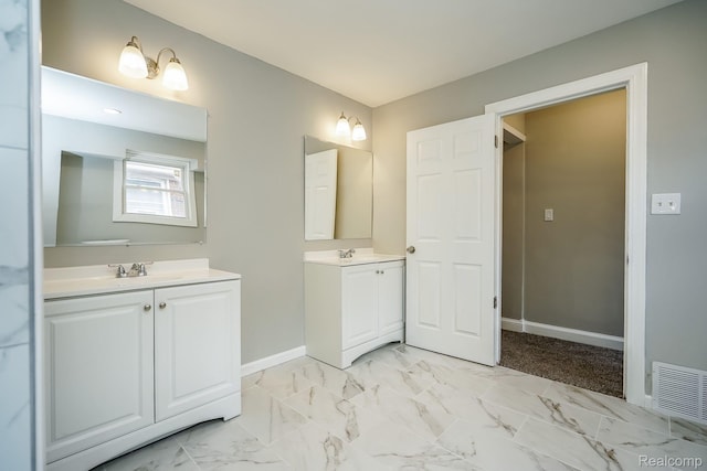 17344 Wisconsin St, Detroit, MI 48221 - bathroom with two vanities and marble finish floors