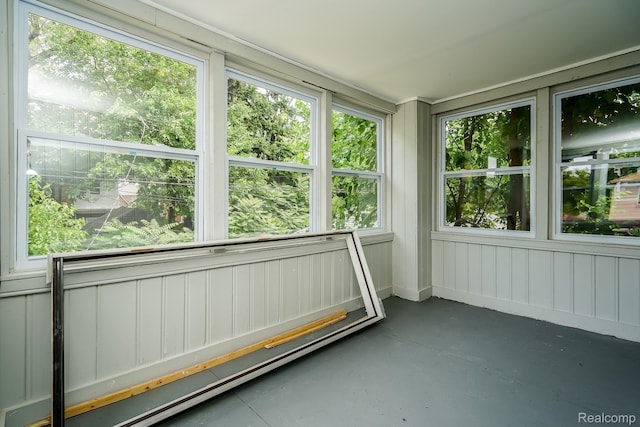17344 Wisconsin St, Detroit, MI 48221 - unfurnished sunroom featuring finished concrete floors