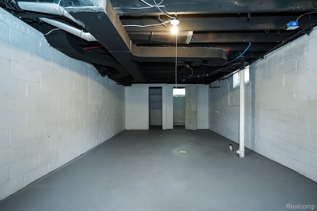 17344 Wisconsin St, Detroit, MI 48221 - unfinished basement with concrete block wall