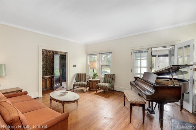 1536 Glynn Ct, Detroit, MI 48206 - living room featuring crown molding and light wood-type flooring