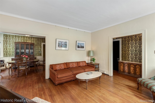 1536 Glynn Ct, Detroit, MI 48206 - living room featuring ornamental molding and light wood-type flooring