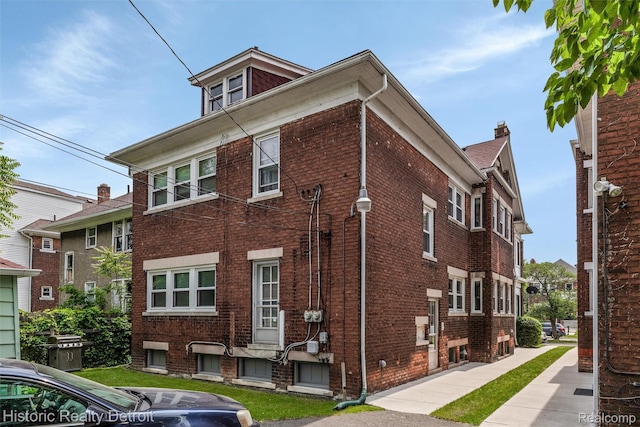 1536 Glynn Ct, Detroit, MI 48206 - view of side of property with brick siding