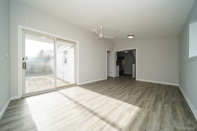 967 Keith St, Oxford, MI 48371 - unfurnished room with wood finished floors and ceiling fan