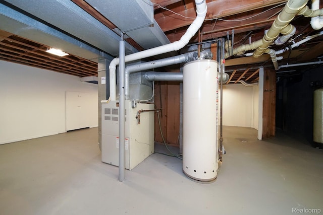 967 Keith St, Oxford, MI 48371 - unfinished basement with gas water heater and heating unit