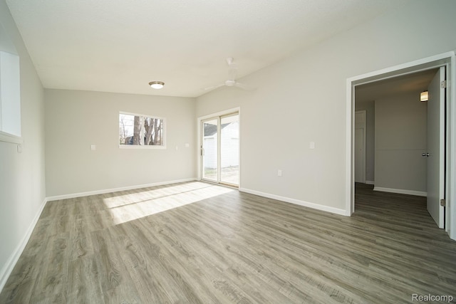 967 Keith St, Oxford, MI 48371 - unfurnished room featuring wood finished floors and ceiling fan