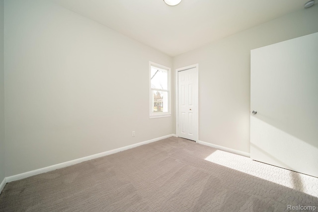 967 Keith St, Oxford, MI 48371 - unfurnished bedroom featuring carpet flooring and a closet