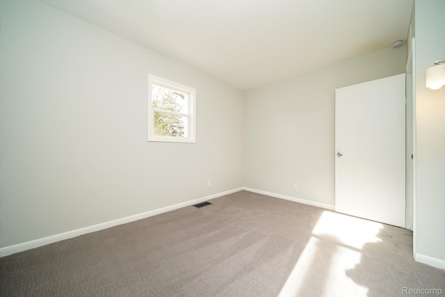 967 Keith St, Oxford, MI 48371 - unfurnished bedroom featuring carpet