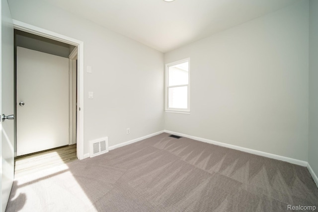 967 Keith St, Oxford, MI 48371 - carpeted empty room featuring baseboards