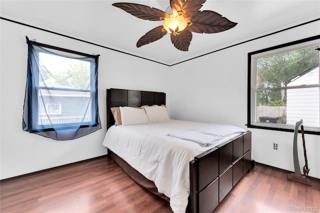 19035 Frazho Rd, Roseville, MI 48066 - bedroom featuring wood finished floors and a ceiling fan