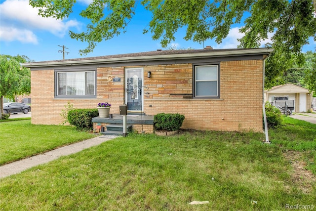 19035 Frazho Rd, Roseville, MI 48066 - view of front facade featuring a front lawn and brick siding