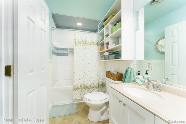 5320 Leland St, Brighton, MI 48116 - full bathroom with vanity, tile patterned flooring, shower / bathtub combination with curtain, wainscoting, and recessed lighting