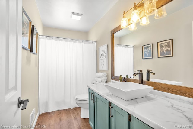 61374 Dean Dr, South Lyon, MI 48178 - bathroom featuring vanity, wood finished floors, a chandelier, and a shower with curtain