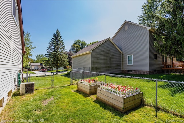 61374 Dean Dr, South Lyon, MI 48178 - view of yard featuring a garden