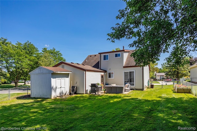 61374 Dean Dr, South Lyon, MI 48178 - back of house with an outdoor living space, a shed, a fenced backyard, and roof with shingles