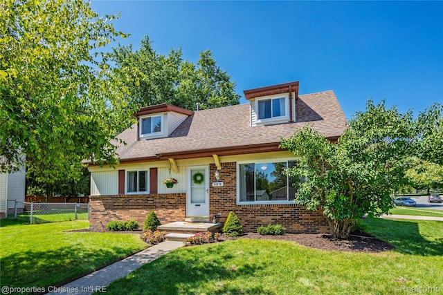 61374 Dean Dr, South Lyon, MI 48178 - view of front of home featuring brick siding and a shingled roof