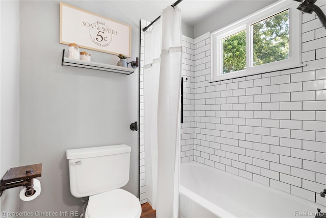 61374 Dean Dr, South Lyon, MI 48178 - full bathroom featuring toilet and shower / bath combo