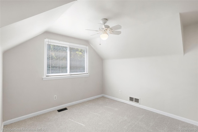 61374 Dean Dr, South Lyon, MI 48178 - bonus room with lofted ceiling, a ceiling fan, and carpet flooring
