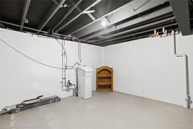 61374 Dean Dr, South Lyon, MI 48178 - unfinished basement with a water softener