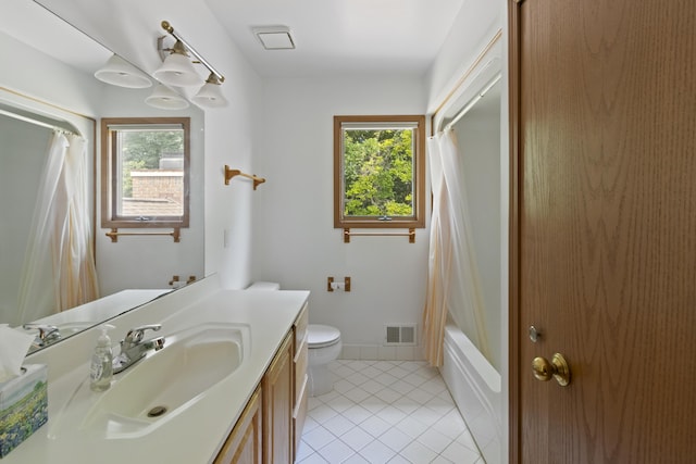 7184 Steeplechase Dr, Saline, MI 48176 - bathroom with vanity, healthy amount of natural light, tile patterned floors, and shower / tub combo with curtain