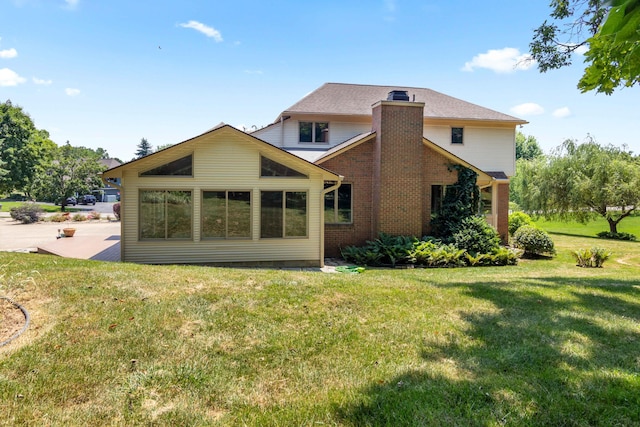 7184 Steeplechase Dr, Saline, MI 48176 - rear view of property featuring a yard and a chimney