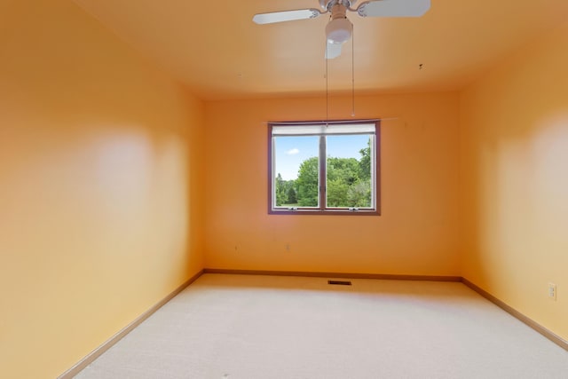 7184 Steeplechase Dr, Saline, MI 48176 - spare room with light carpet and ceiling fan